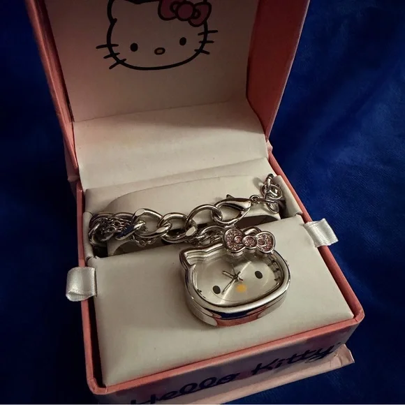 Hello Kitty Silver Charm Bracelet Watch with Pink Bow Accents - Picture 3 of 4
